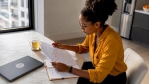 Woman reviewing workforce certification funding documents