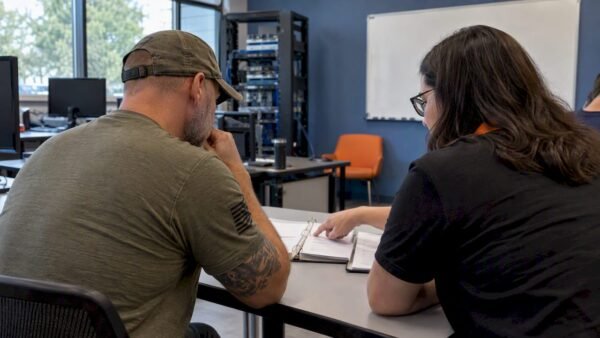 Veteran comparing cybersecurity career training paths